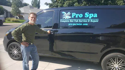 Pro Spa owner standing next to service vehicle